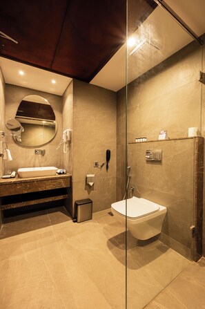 Shower, hair dryer, slippers, towels