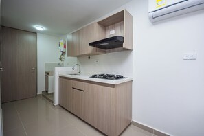Superior Studio, City View | Private kitchen - Apartahotel Ces (Medellin)