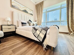 Business Apartment, City View | Premium bedding, in-room safe, individually decorated - Cosmos Living Work-Friendly Metro Access (Dubai)