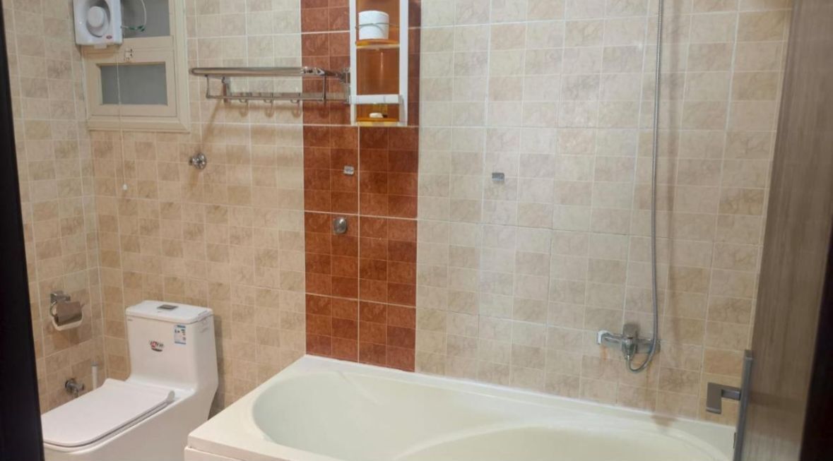 Shower, slippers, towels, soap