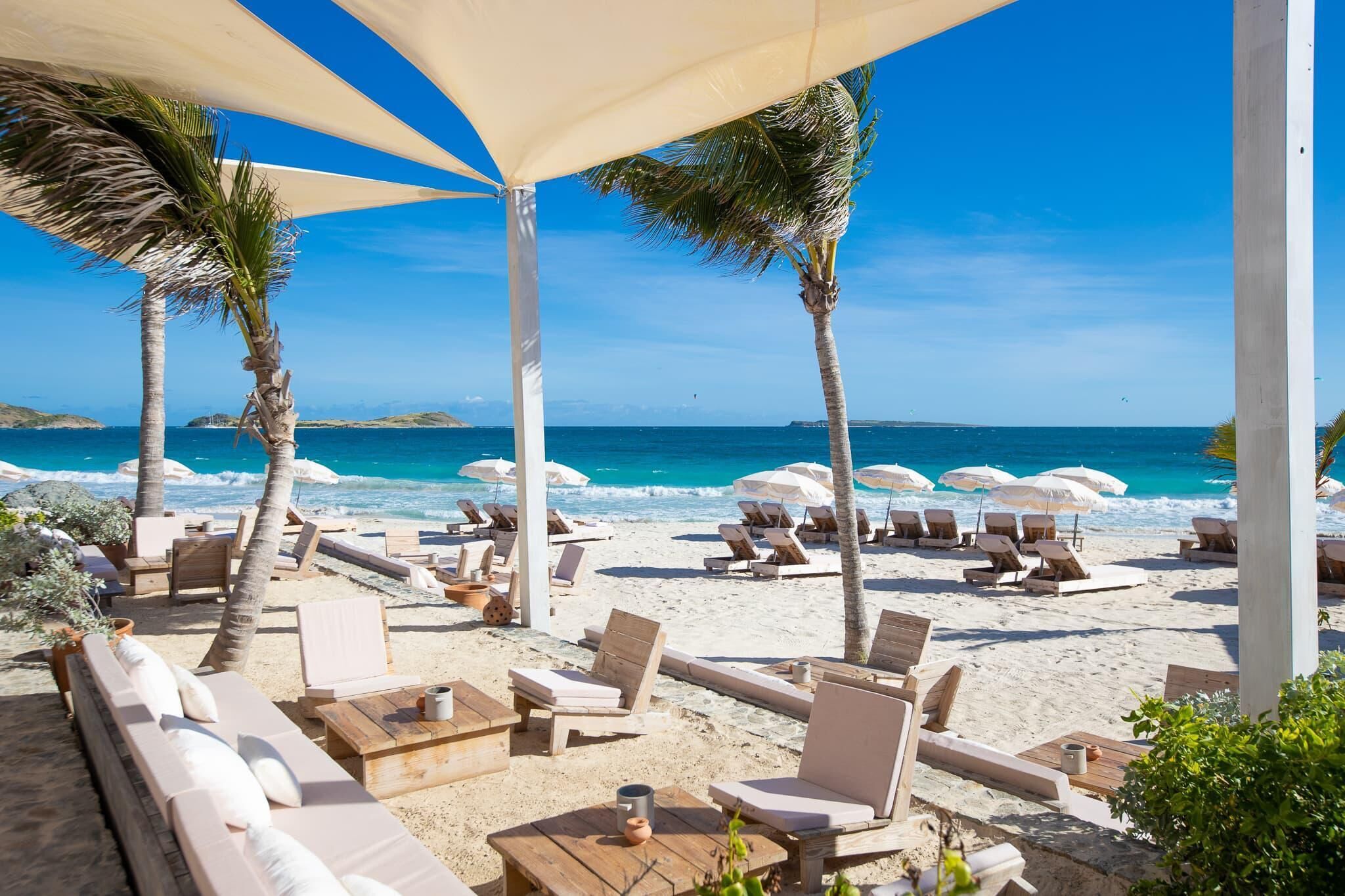 On the beach, sun loungers, beach towels