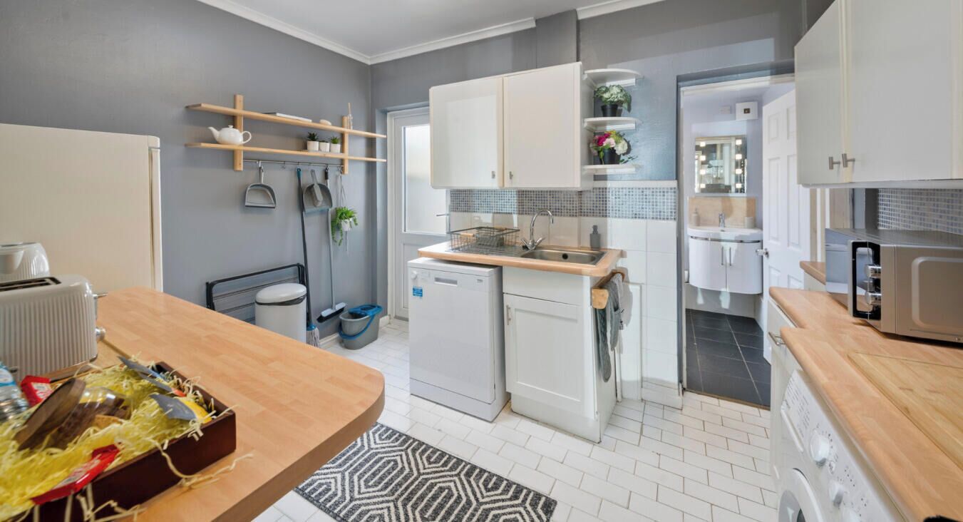 Microwave, coffee/tea maker, dining tables