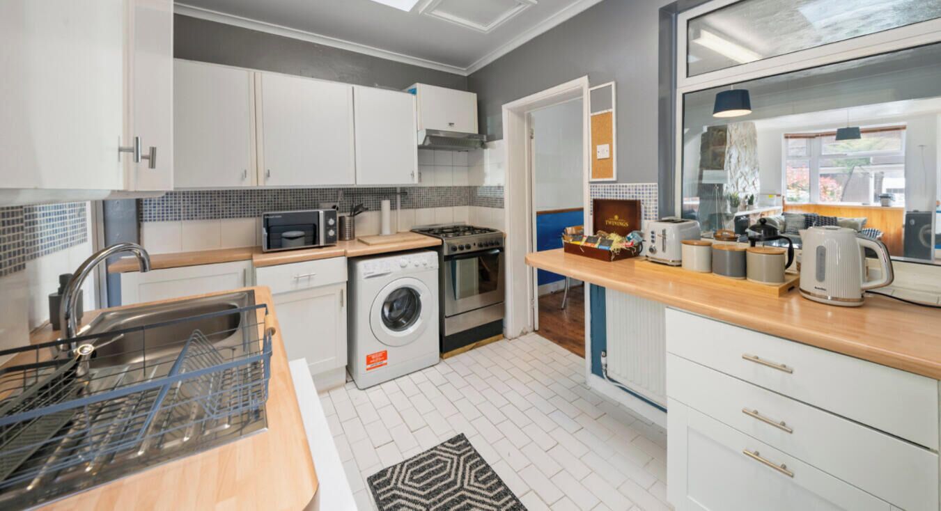 Microwave, coffee/tea maker, dining tables