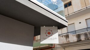 A sign for 'I Tramonti del Golf' indicating rooms and luxury apartments. - Room 'Camera 2 - P2' with Balcony, Wi-Fi, and Air Conditioning (Balestrate)