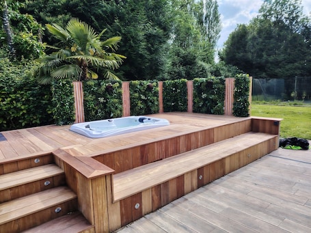 Outdoor spa tub. Normandy House: Spa, Pool, Jacuzzi & Tennis – 12 Guests