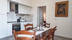 Luxury Apartment, Balcony, City View | Private kitchen | High chair - Palazzo dei Pavoni Relais di Charme (L'Aquila)