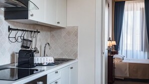 Apartamento superluxo, sacada, vista para a cidade | Cozinha privada | Cadeirão de bebê