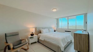 The bedroom features a dreamy king-size bed, AC, blackout shades & an adjacent bathroom with a walk-in closet. - Baía Celeste: Oceanfront with amazing views (Fajardo)