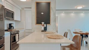 or, enjoy your meal on the buffet-style countertop by the kitchen.  - Baía Celeste: Oceanfront with amazing views (Fajardo)