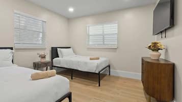 4 bedrooms, iron/ironing board, travel cot, WiFi