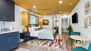 Signature Studio, 1 King Bed, Non Smoking, Kitchenette | Living area | 40-inch Smart TV with digital channels