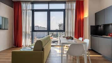 Deluxe appartement, uitzicht op stad | Woonruimte