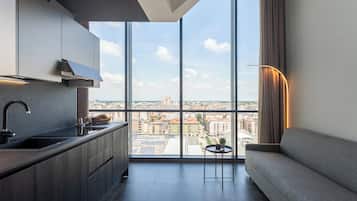 Deluxe-Apartment, Stadtblick | Wohnbereich