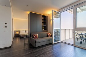 Deluxe Apartment, Terrace, City View | Living area - Htm Hybrid Tower Mestre by Halldis (Mestre)