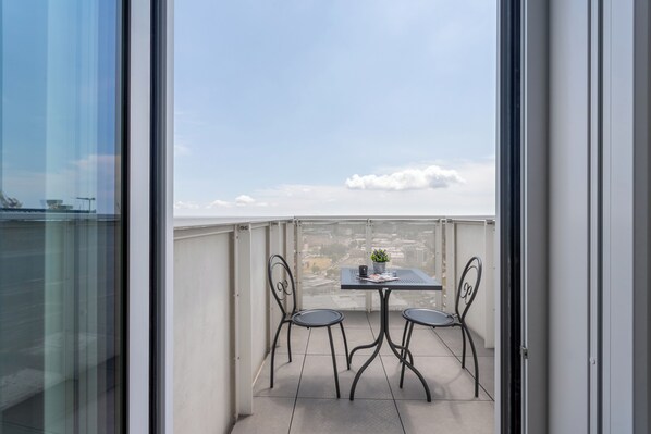 Deluxe Apartment, Terrace, City View | Outdoor dining - Htm Hybrid Tower Mestre by Halldis (Mestre)