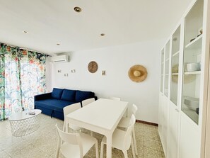 Dining - Beachside Retreat: 2nd Line, A/C, WiFi, Balcony, Parking, Near Shops, Sleeps 6 (Roses)