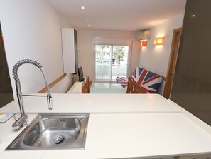 Interior - Royal Apartments: Modern Stay with Pool, Terrace & A/C, 500m from Levante Beach, Near Port Aventura (Salou)