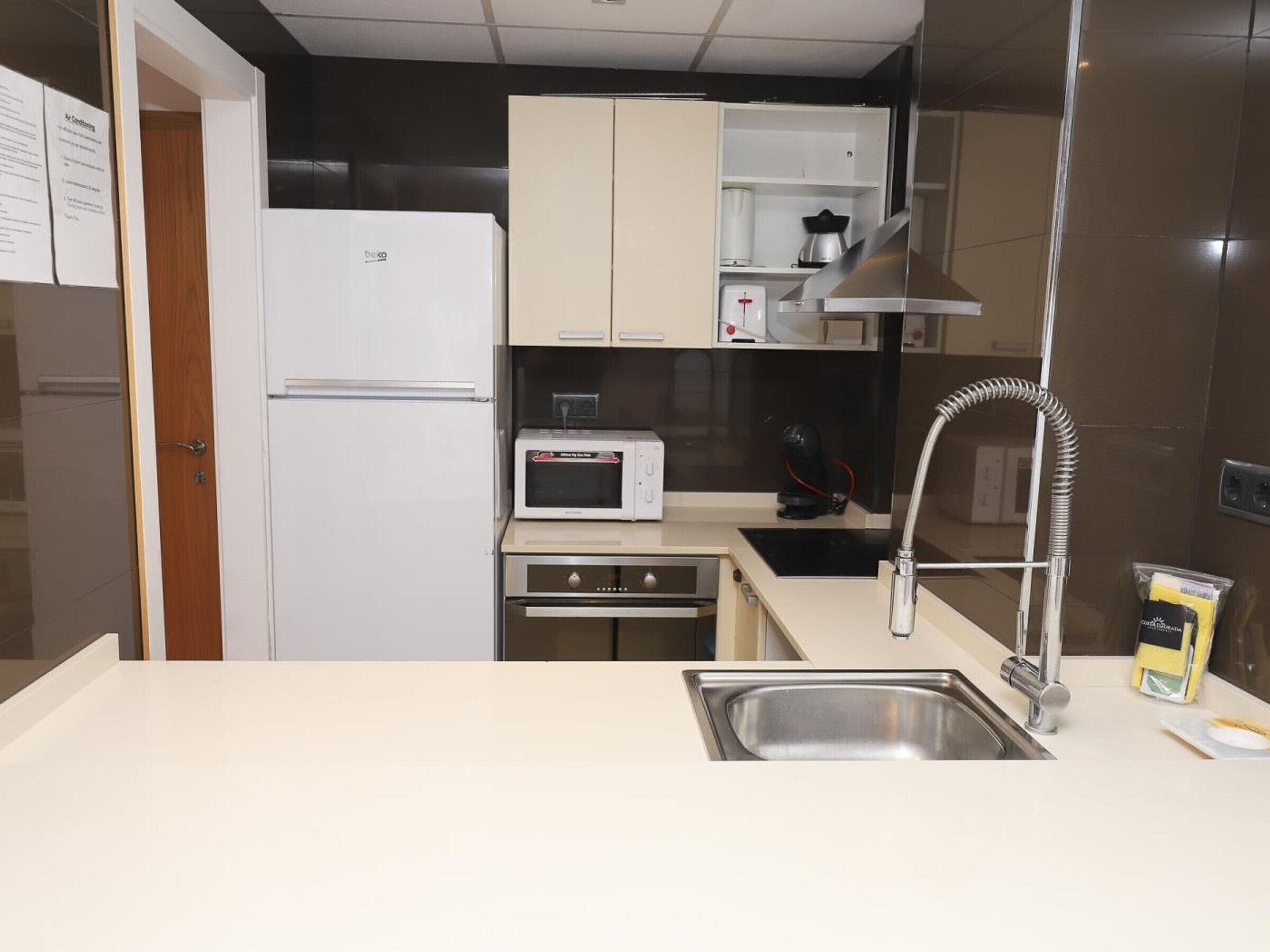 Fridge, microwave, oven, coffee/tea maker