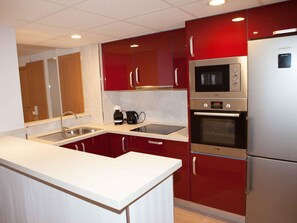 Fridge, microwave, oven, coffee/tea maker - Royal Apartments - 2BR, AC, Pool, Near Beach and PortAventura, Salou (Salou)