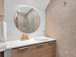 Shower, hair dryer, towels