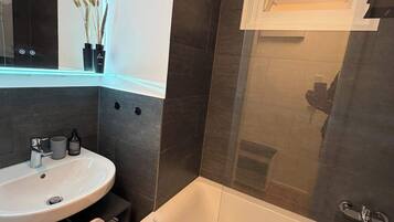 Shower, free toiletries, hair dryer, towels