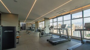 A gym with treadmills, stationary bikes, and weight machines. - Comfort Near Allianz Parque Sp-p1804b (São Paulo)