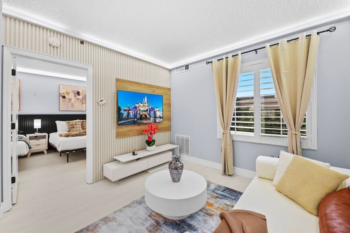 1 bedroom, desk, iron/ironing board, travel crib