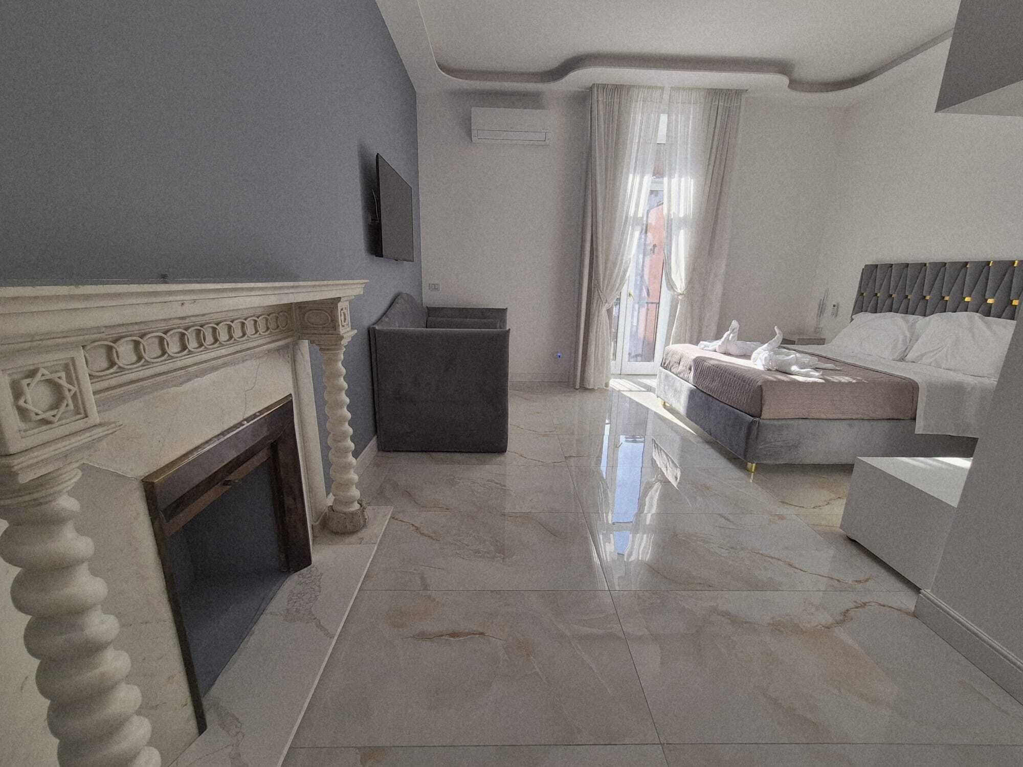 Comfort Quadruple Room, Partial Sea View | Down comforters, minibar, in-room safe, desk