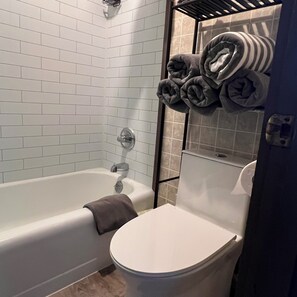 Hair dryer, towels, soap, shampoo