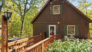 A rustic cabin with a wooden deck and a small porch. - Cece's Chalet: Hot Tub * New Owner Offer (Mount Jackson)