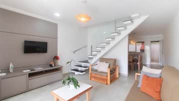 Basic Apartment | Living area | 32-inch Smart TV with digital channels