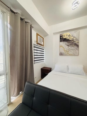 Iron/ironing board, bed sheets, wheelchair access - Family-Friendly Studio Escape at One Madison Tower (Iloilo City)