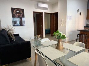 Comfort Apartment | Living area | TV