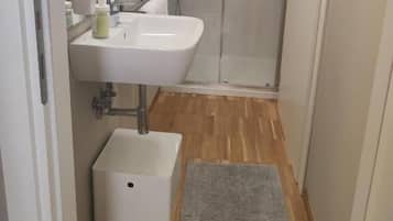 Shower, free toiletries, hair dryer, slippers