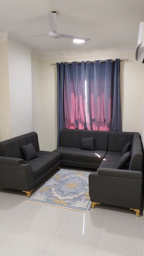 Căn hộ dành cho gia đình, quang cảnh vườn | Khu phòng khách