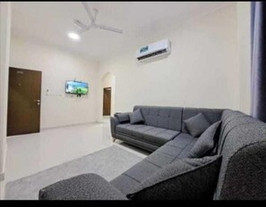 Appartamento familiare, vista giardino | Area soggiorno