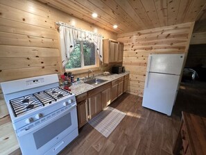 Fridge, microwave, oven, stovetop - Madison River Cabin Rental #41 (W YELLOWSTONE)