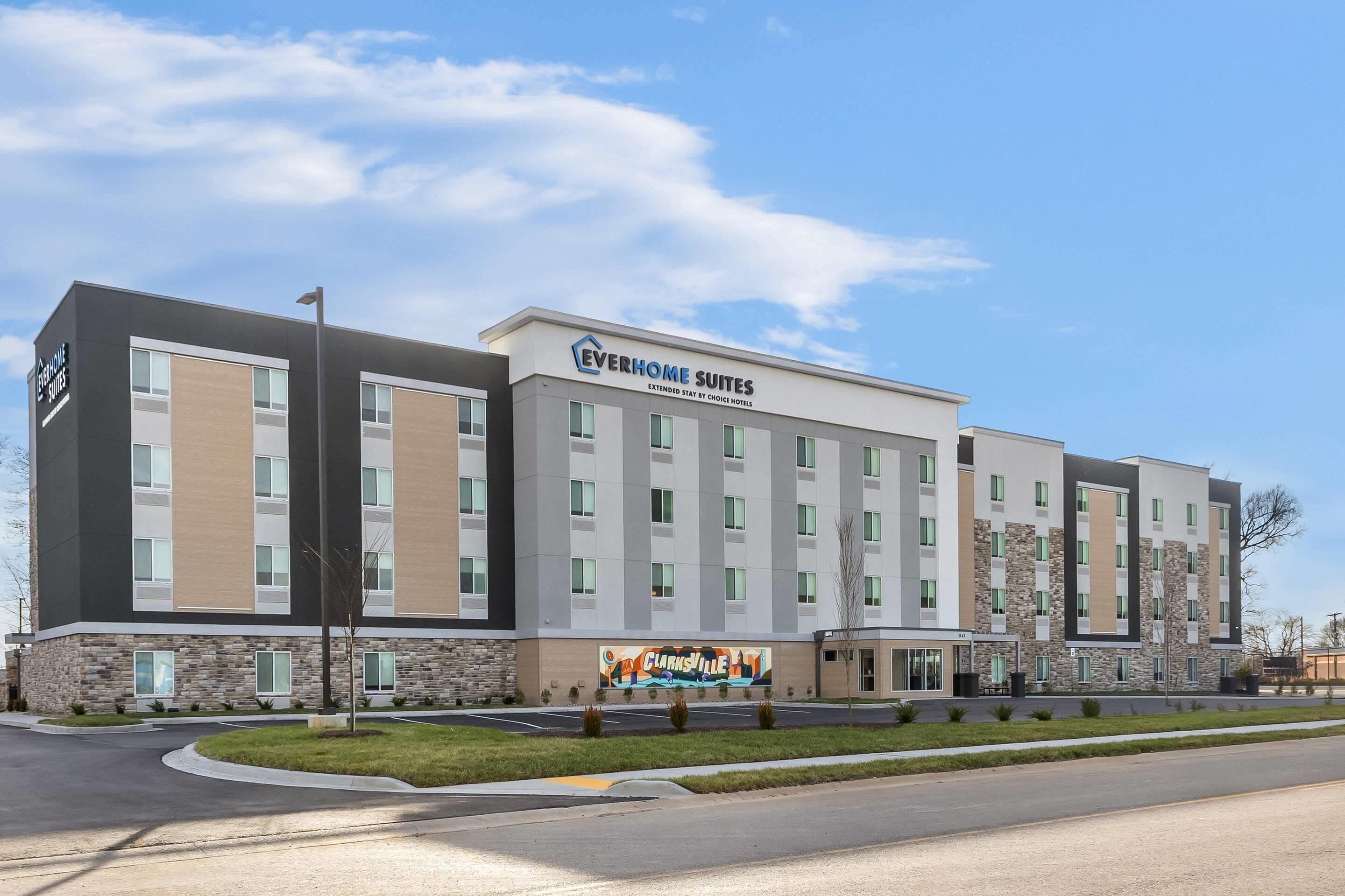 A modern hotel with a sign reading "Everhome Suites Extended Stay by Choice Hotel."