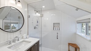 Shower, hair dryer, towels, soap