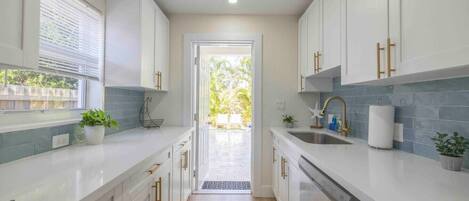 Microwave, oven, coffee/tea maker, cookware/dishes/utensils