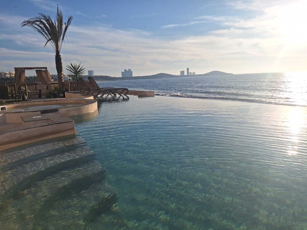 Outdoor pool, a heated pool - Exclusive beachfront apartment! (Sin.)