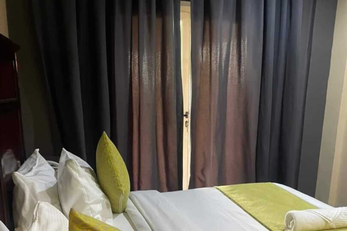 Executive Room, Garden View | In-room safe, desk, laptop workspace, blackout drapes