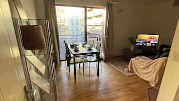 Comfort Apartment, Balcony, Garden View | Living area | Flat-screen TV