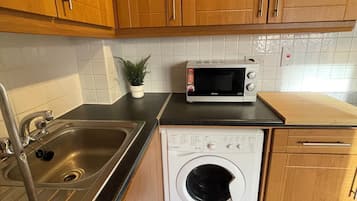 Apartamento Confort, balcón, vistas al jardín | Cocina privada