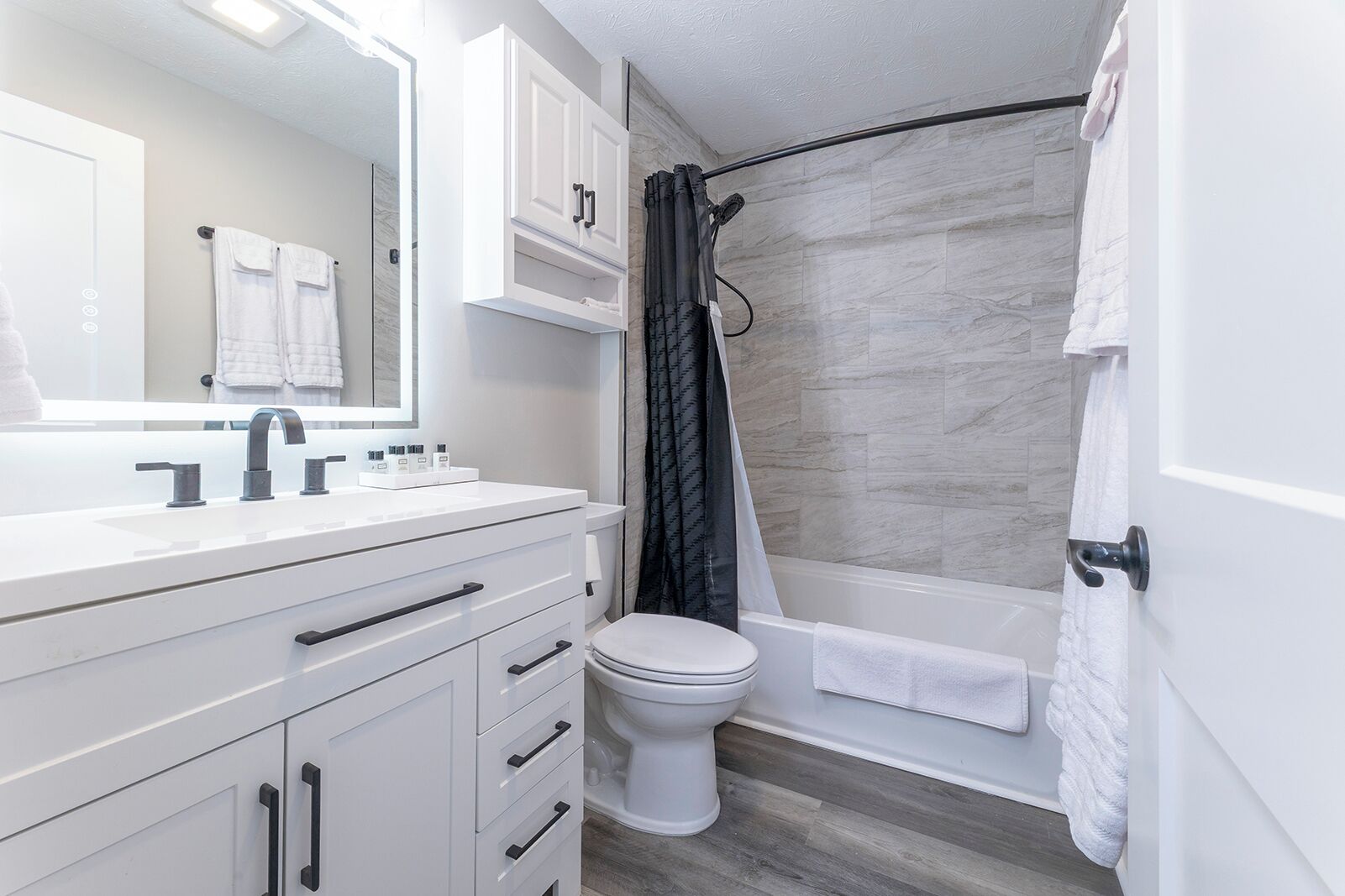 Hair dryer, towels, soap, shampoo