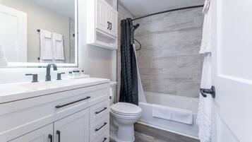 Hair dryer, towels, soap, shampoo