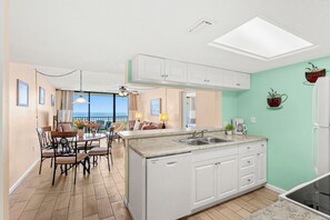 Fridge, microwave, oven, stovetop - Beautiful Condo with Panoramic Ocean Views: Double‑Wide Balcony, Heated Pool & Hot Tub ☀️ (Cape Canaveral)