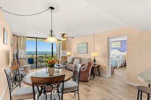 TV - Beautiful Condo with Panoramic Ocean Views: Double‑Wide Balcony, Heated Pool & Hot Tub ☀️ (Cape Canaveral)