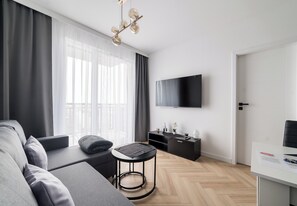 TV - Stacja Jeżyce Lavish Apartment (Poznań)