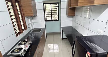 Cozy 1-bedroom apartment in beautiful Kozhikode with AC - Ground floor